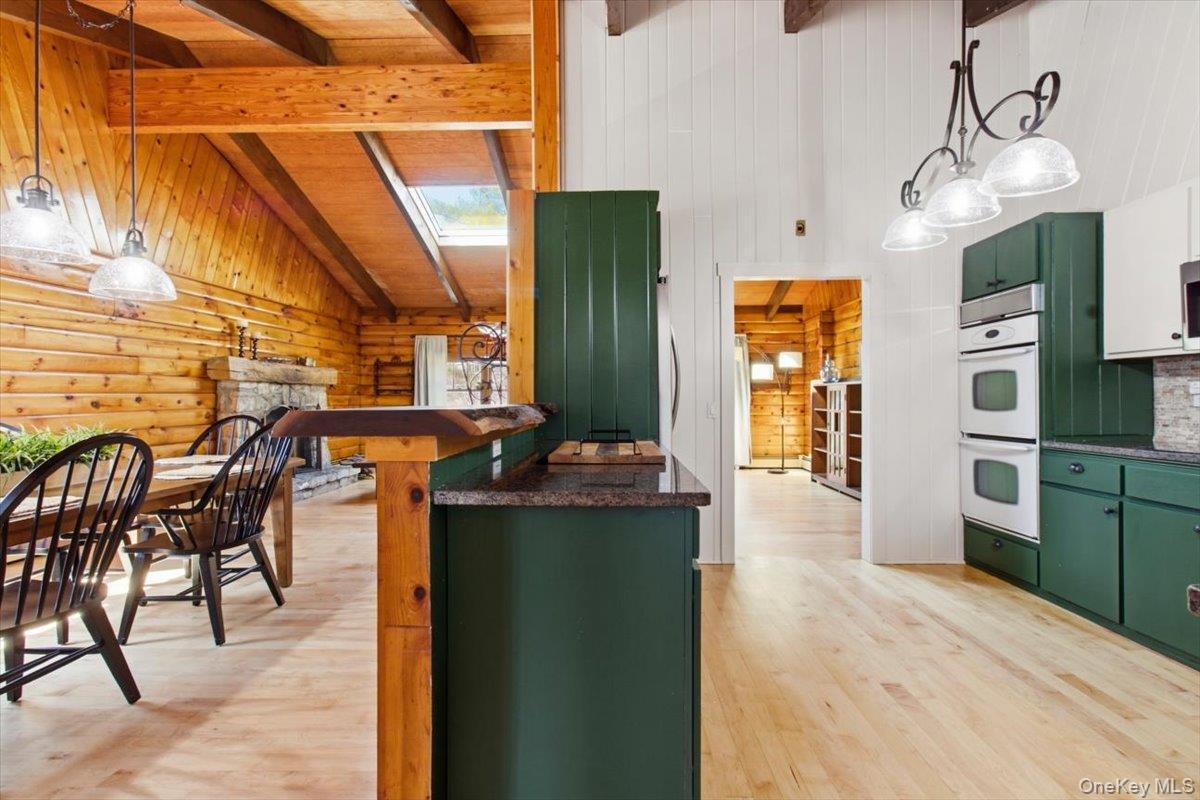 183 Bullet Hole Road Mahopac, NY 10541 - Photo 25 of 44 a kitchen with stainless steel appliances kitchen island granite countertop a refrigerator and a stove top oven