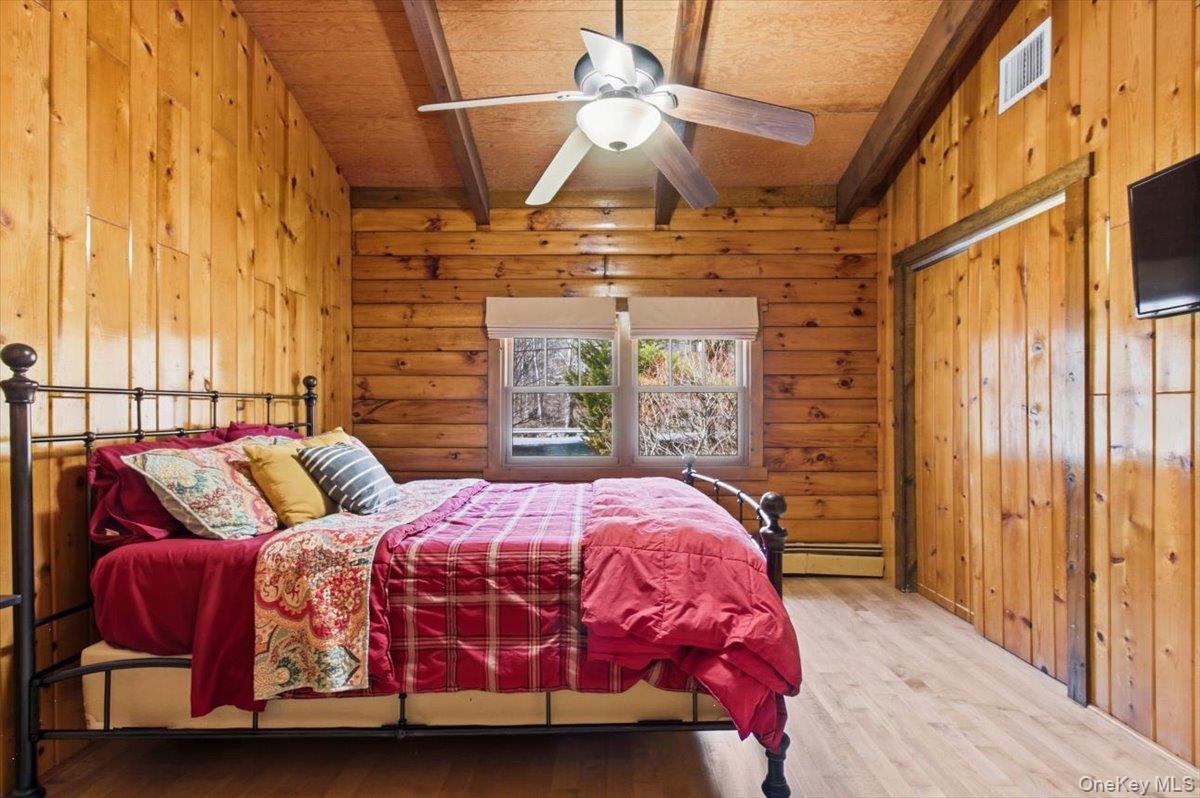 183 Bullet Hole Road Mahopac, NY 10541 - Photo 26 of 44 a bedroom with a bed next to a window