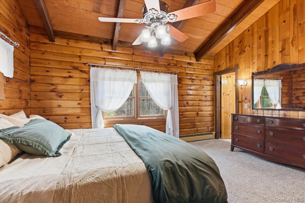 183 Bullet Hole Road Mahopac, NY 10541 - Photo 29 of 44 a bedroom with a bed and a dresser