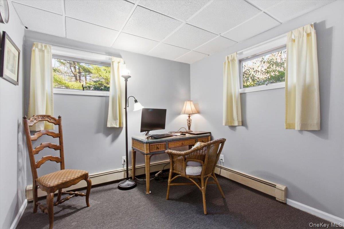 183 Bullet Hole Road Mahopac, NY 10541 - Photo 36 of 44 a view of a workspace with furniture and a window