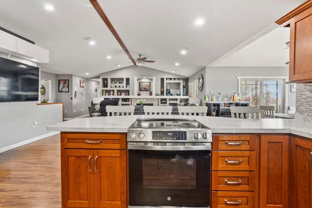 a kitchen with a stove and a sink