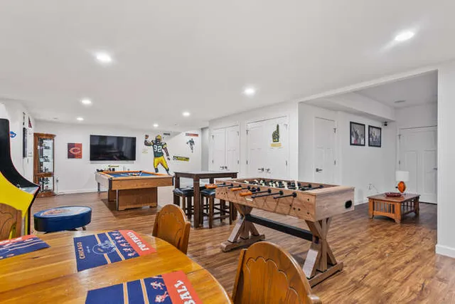 a room with furniture and a flat screen tv