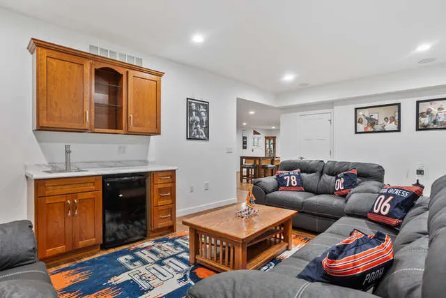 a bed room with a bed and a dresser