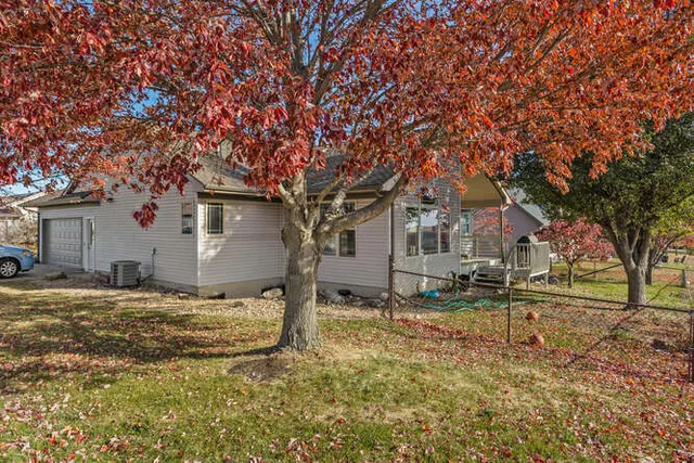 a view of a patio with a table and chairs