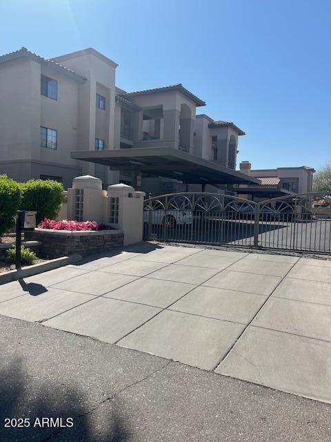 7609 East Indian Bend Road, Unit 1012 Scottsdale, AZ 85250 - Photo 2 of 23 Gate Entrance to Paradise Vilas