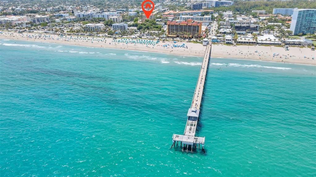 9 Northeast 20th Avenue, Unit 403 Deerfield Beach, FL 33441 - Photo 44 of 58 a house with a yard