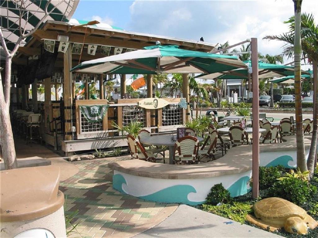 9 Northeast 20th Avenue, Unit 403 Deerfield Beach, FL 33441 - Photo 55 of 58 a view of water fountain in front of building