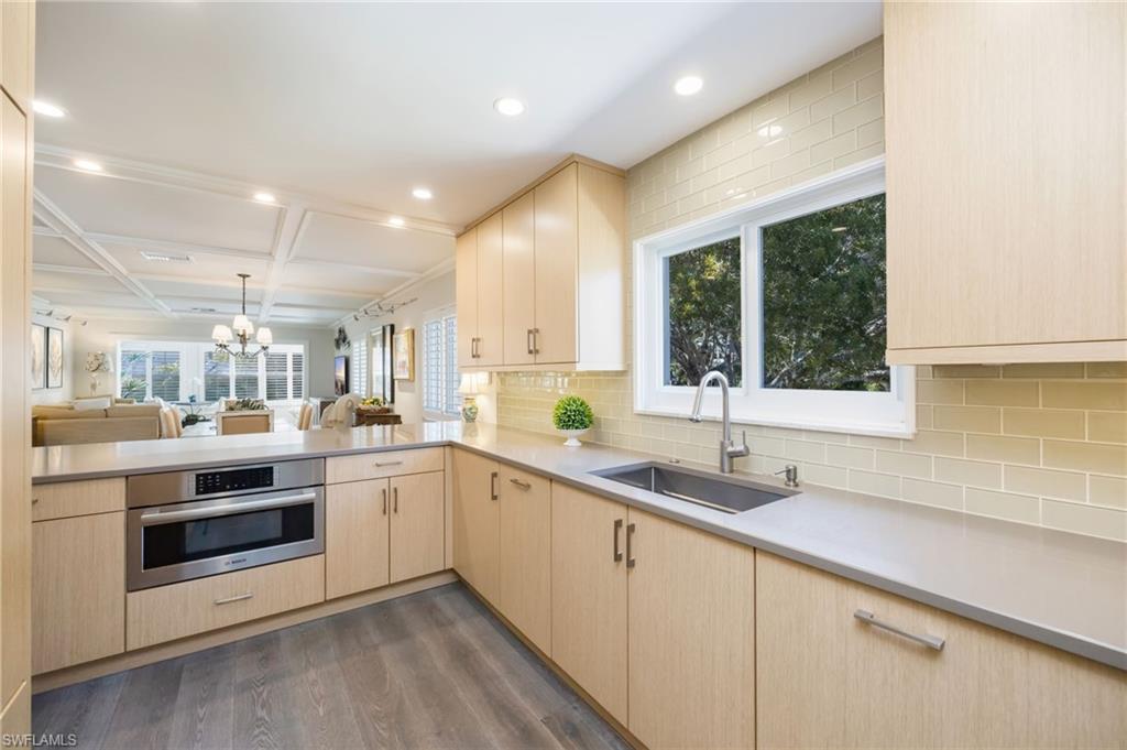 308 2nd Street South, Unit 308 Naples, FL 34102 - Photo 11 of 36 The custom kitchen is a chef's dream