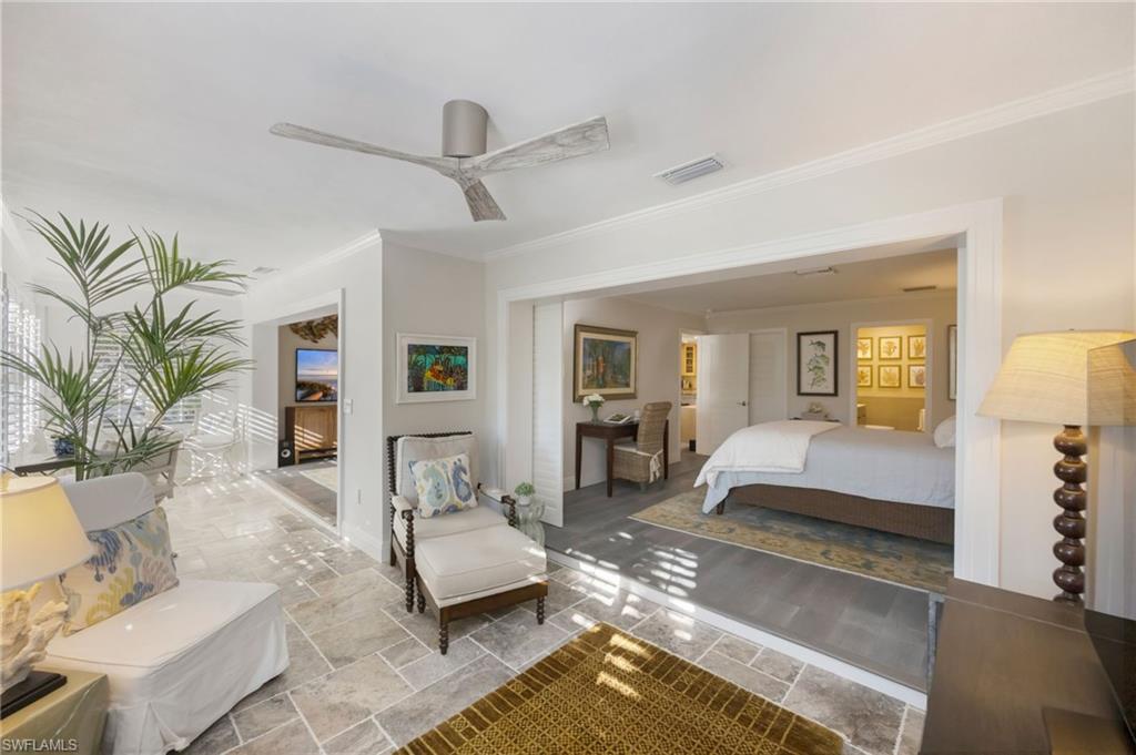 308 2nd Street South, Unit 308 Naples, FL 34102 - Photo 18 of 36 Sitting room located off of the primary ensuite bedroom.