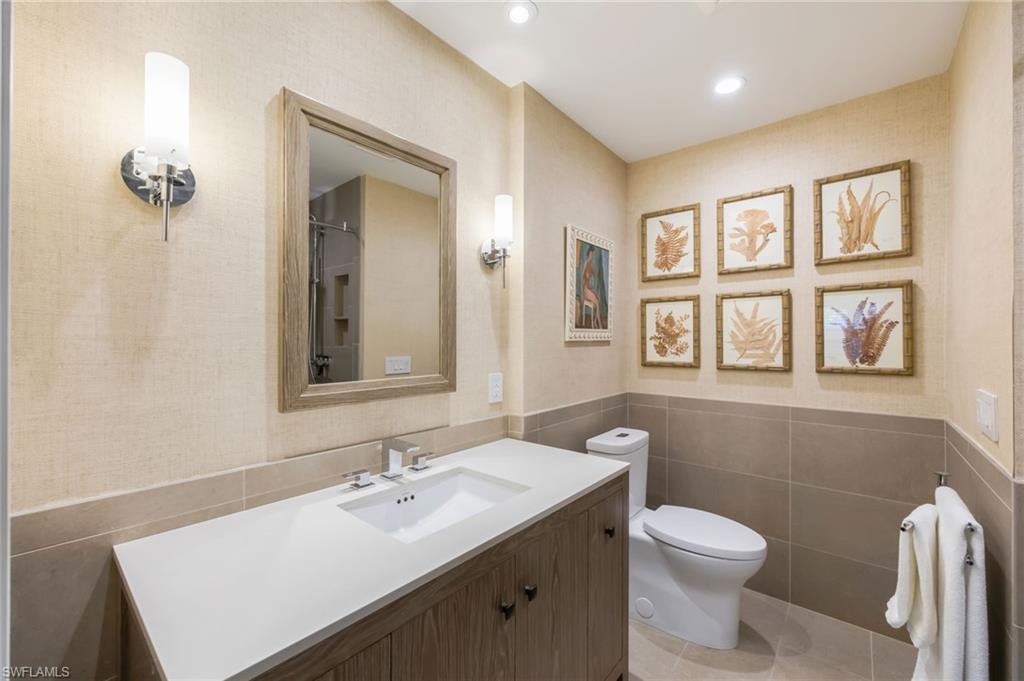 308 2nd Street South, Unit 308 Naples, FL 34102 - Photo 22 of 36 Renovated primary bathroom