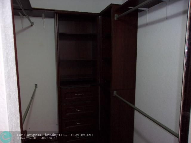 1564 Sunset Way Weston, FL 33327 - Photo 11 of 40 a view of walk in closet