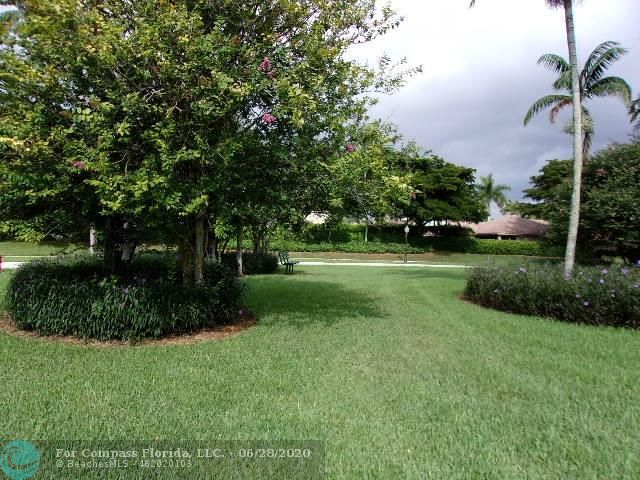 1564 Sunset Way Weston, FL 33327 - Photo 20 of 40 a view of a park with a tree