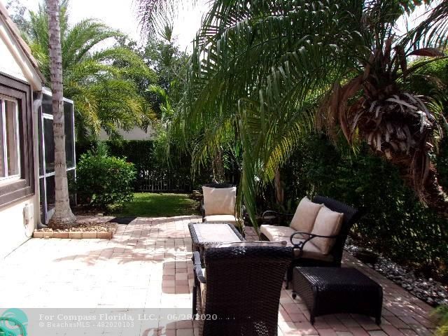 1564 Sunset Way Weston, FL 33327 - Photo 28 of 40 a view of outdoor space yard and patio