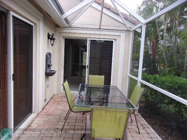 1564 Sunset Way Weston, FL 33327 - Photo 29 of 40 a view of balcony with furniture