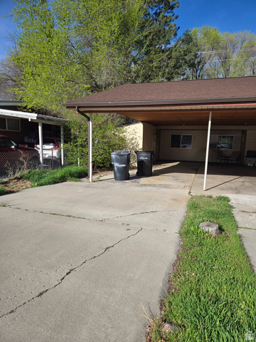 490 Averett Avenue, Unit 1 Springville, UT 84663 - Photo 2 of 11 View of parking featuring driveway and a carport