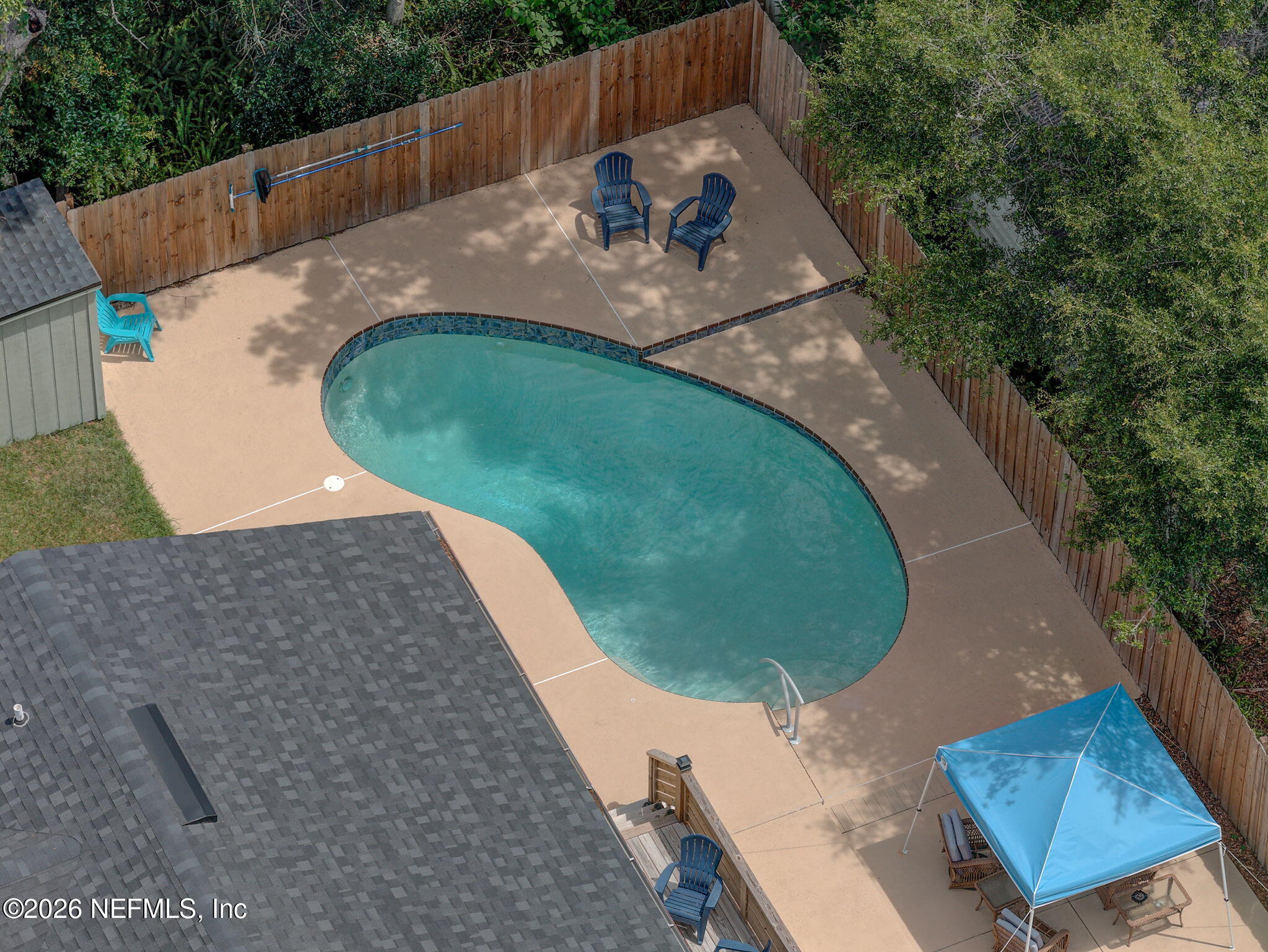 507 Gentian Road St. Augustine, FL 32086 - Photo 52 of 82 an aerial view of a house with a yard and trees