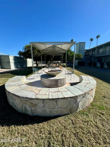 a view of a swimming pool with a patio