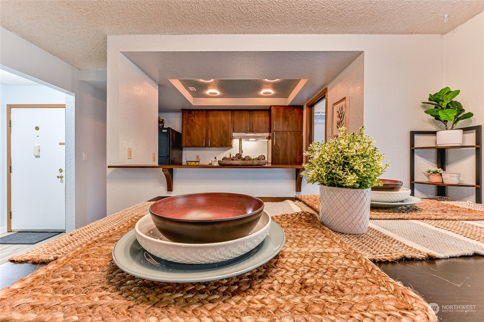 14401 Southeast Petrovitsky Road, Unit E105 Renton, WA 98058 - Photo 13 of 38 a view of a living room and dining room