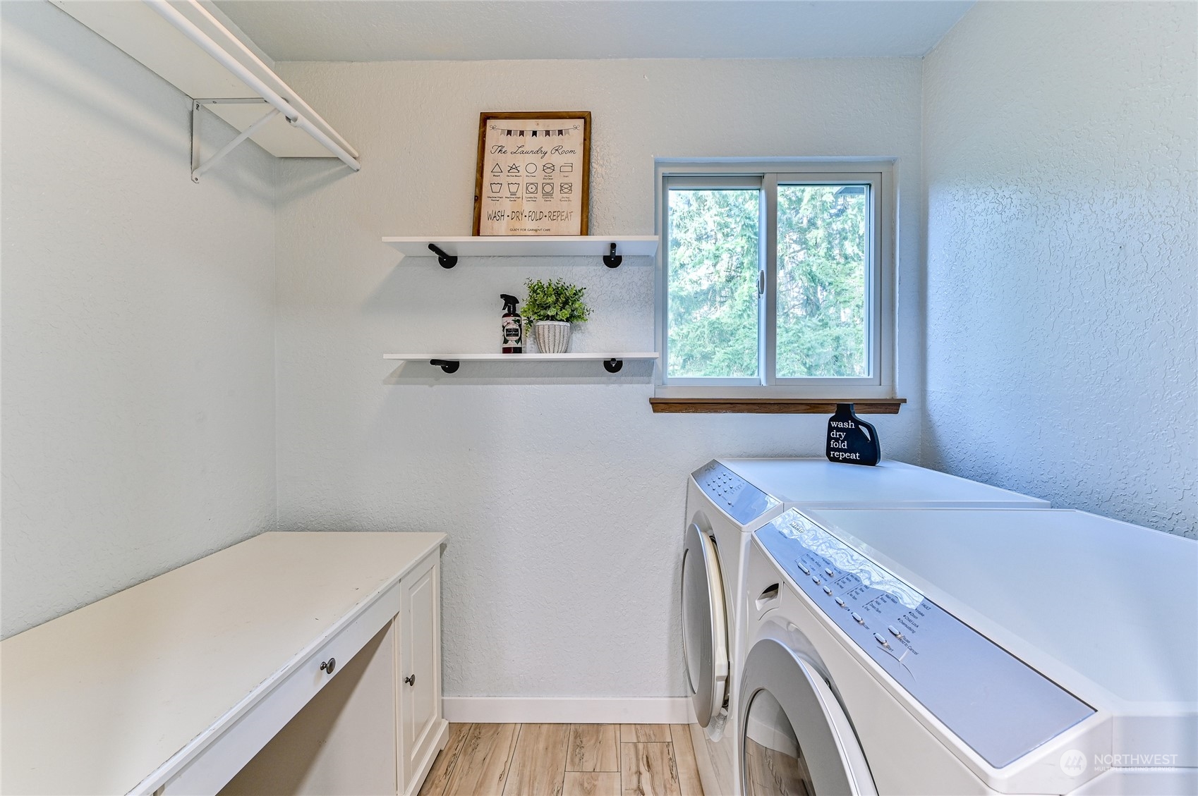 14401 Southeast Petrovitsky Road, Unit E105 Renton, WA 98058 - Photo 6 of 38 a utility room with a window dryer and washer
