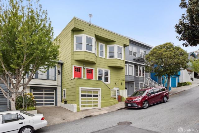 a car parked in front of a building