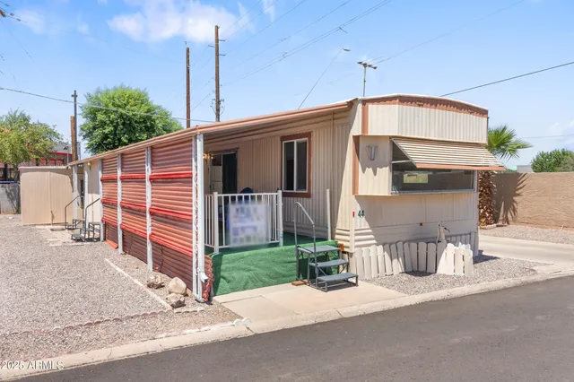 a front view of a house with garage