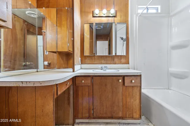 a bathroom with a sink and a bathtub