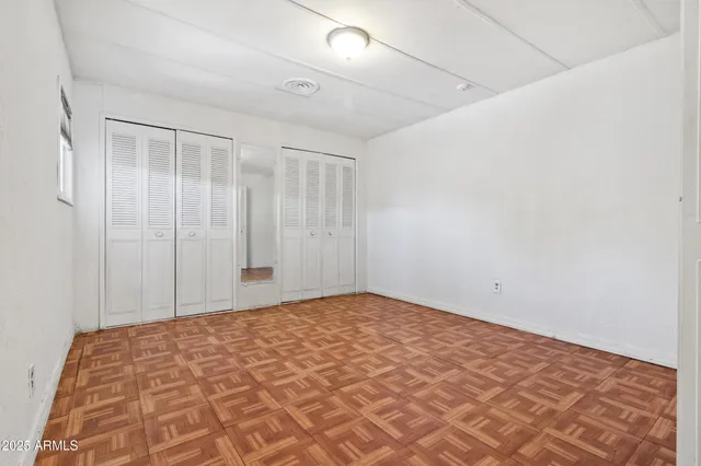 a view of a room with a wardrobe space