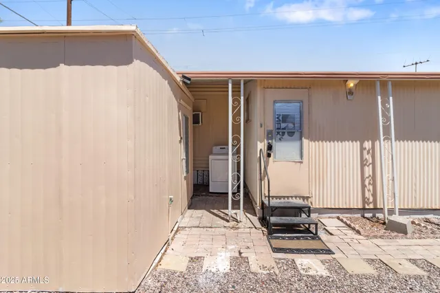 a view of a street with a building