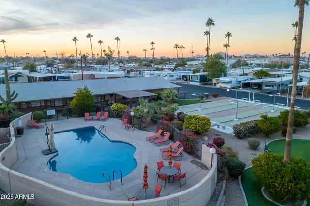 a view of a patio with swimming pool