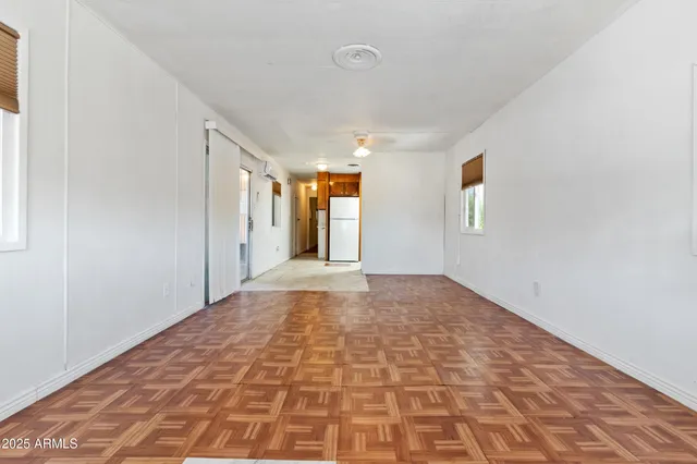 a view of an empty room and window