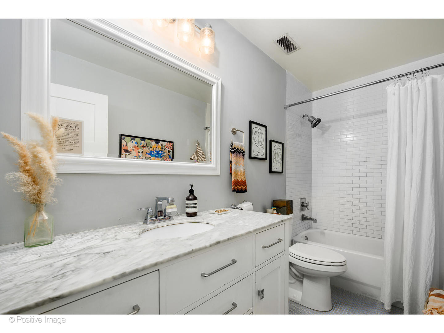 1500 West Monroe Street, Unit 215 Chicago, IL 60607 - Photo 11 of 14 a bathroom with a granite countertop shower sink vanity mirror and toilet