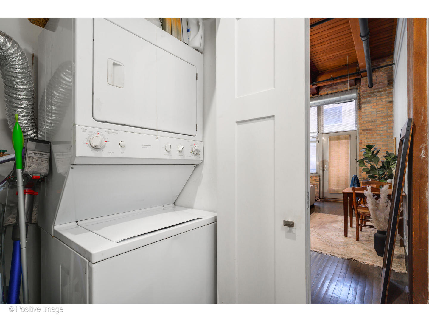 1500 West Monroe Street, Unit 215 Chicago, IL 60607 - Photo 12 of 14 a utility room with dryer and washer