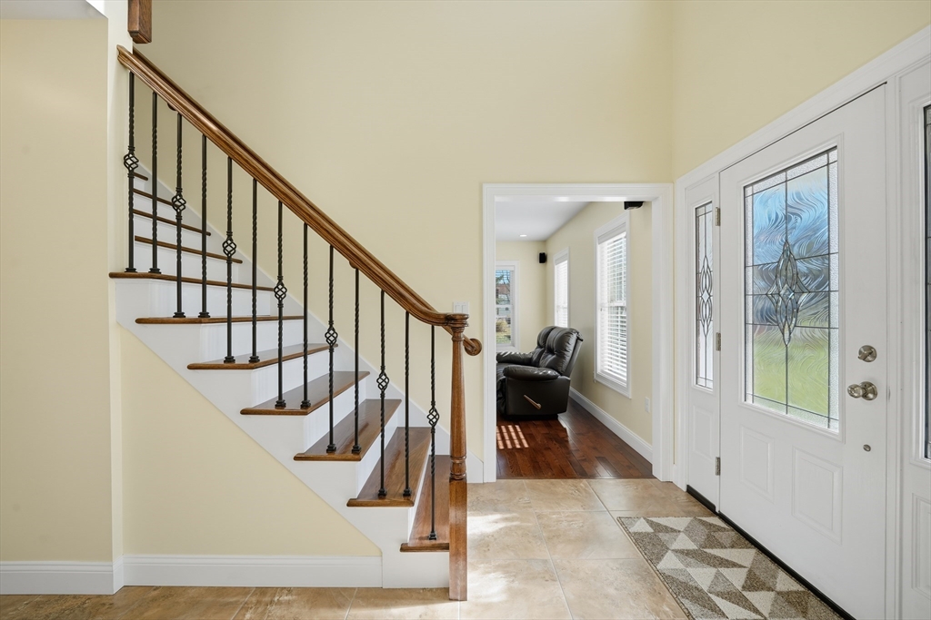 559 East State Street Granby, MA 01033 - Photo 17 of 41 a view of entryway with wooden floor and a livingroom view