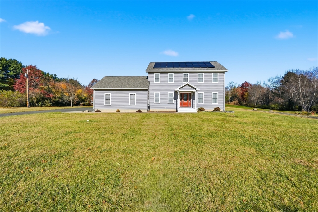 559 East State Street Granby, MA 01033 - Photo 2 of 41 a big house with a big yard and large trees