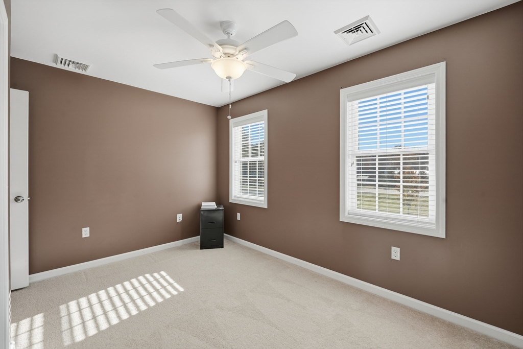 559 East State Street Granby, MA 01033 - Photo 31 of 41 a view of an empty room with a window