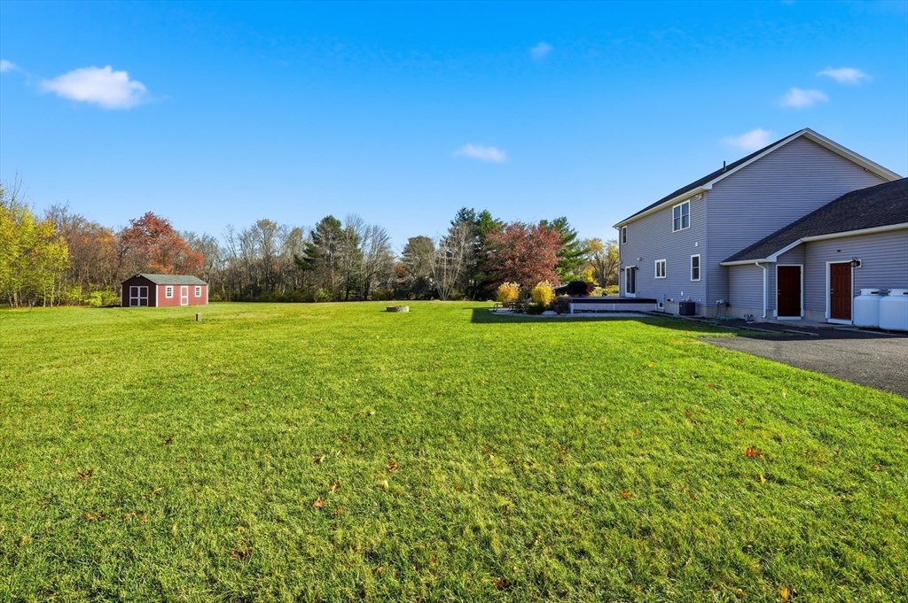 559 East State Street Granby, MA 01033 - Photo 38 of 41 a view of a house with a big yard