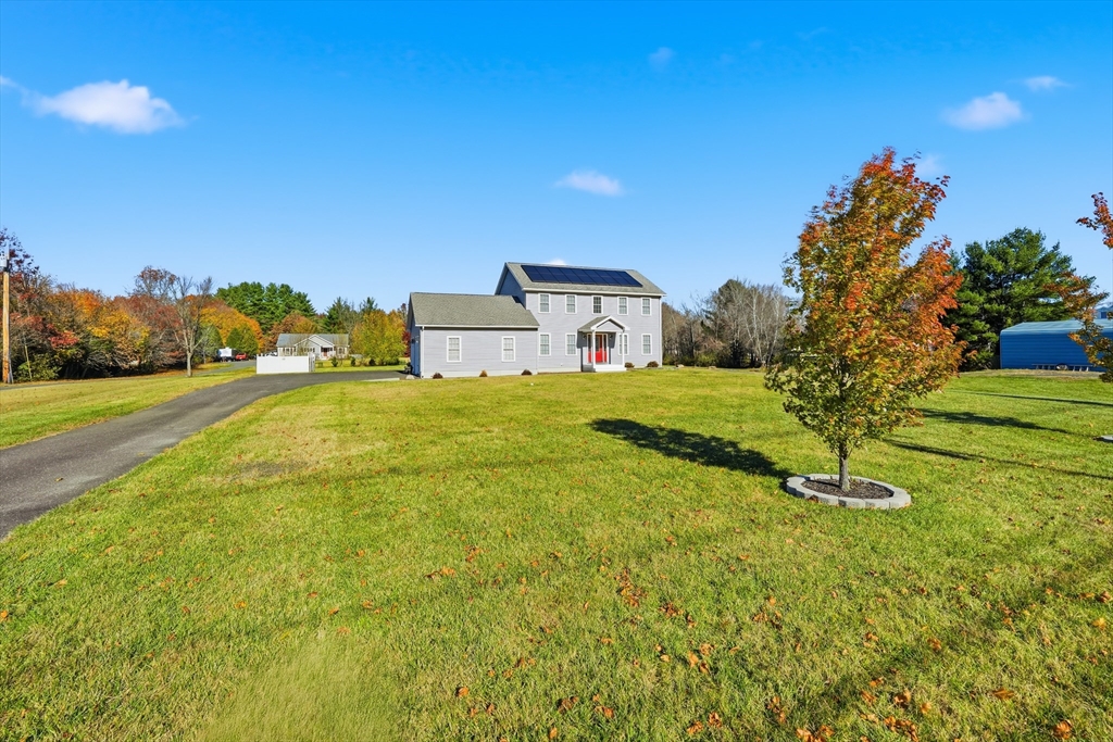 559 East State Street Granby, MA 01033 - Photo 41 of 41 a view of a big yard with a house