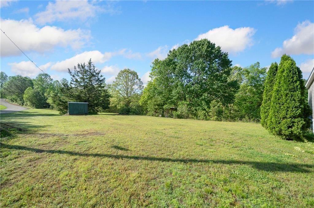 1575 Davis Road West Fairmount, GA 30139 - Photo 34 of 49 a view of a yard with an outdoor space
