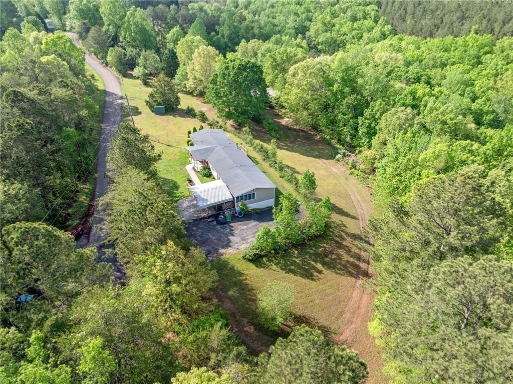 1575 Davis Road West Fairmount, GA 30139 - Photo 40 of 49 an aerial view of a house with a yard