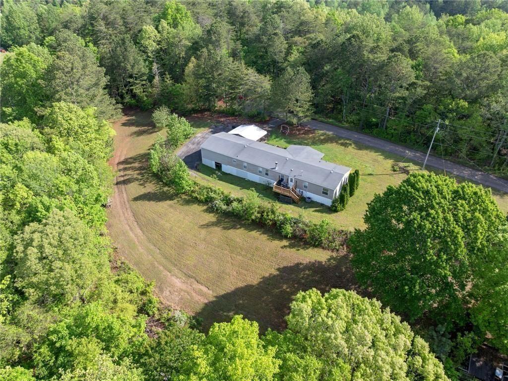1575 Davis Road West Fairmount, GA 30139 - Photo 41 of 49 an aerial view of a house with a yard