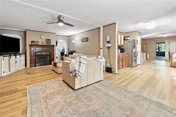 a view of living room with furniture and flat screen tv