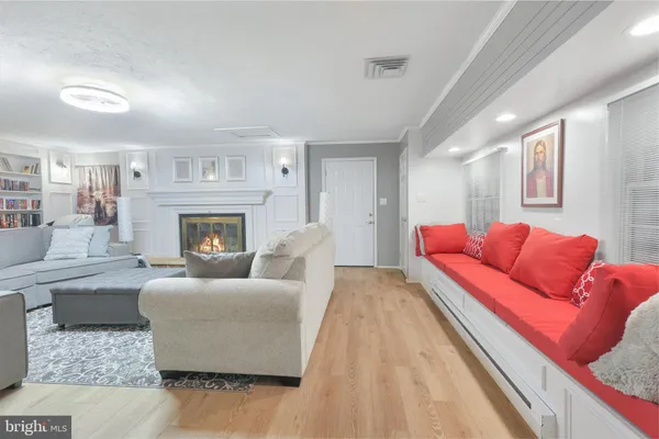 a bedroom with a bed and a lamp