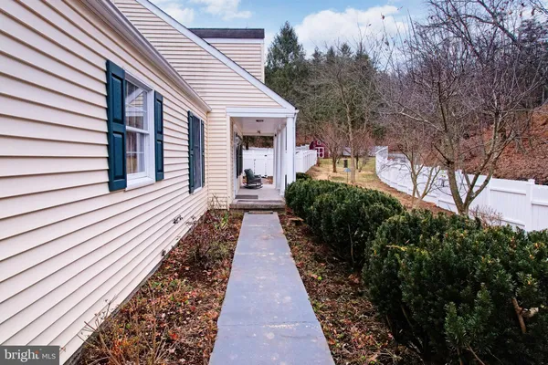 a kitchen with stainless steel appliances a sink stove and refrigerator