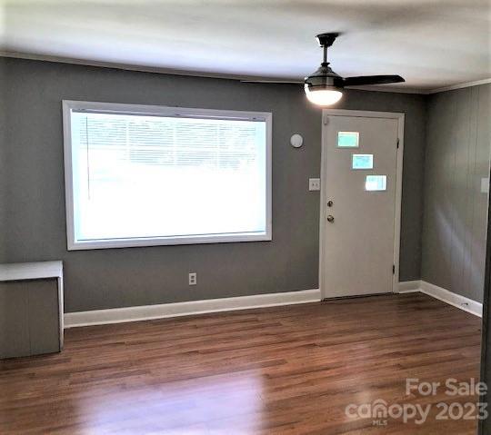 510 Tabor Road Olin, NC 28660 - Photo 4 of 16 a view of an empty room with wooden floor and a window