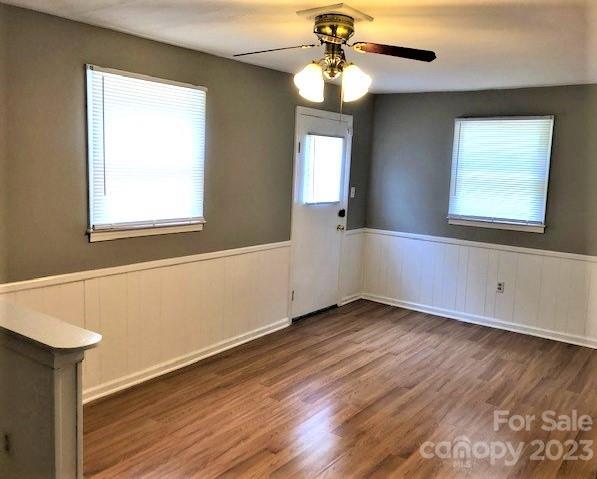 510 Tabor Road Olin, NC 28660 - Photo 5 of 16 a view of an empty room with window and wooden floor