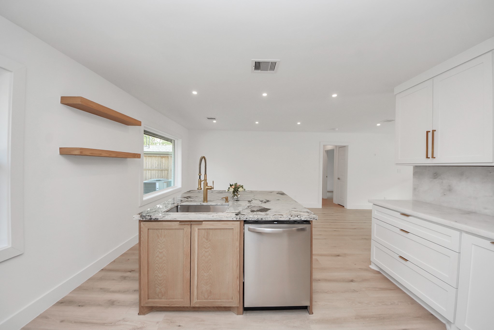 2318 Hialeah Drive Houston, TX 77018 - Photo 21 of 42 Kitchen island offers a built in microwave, dishwasher and sink