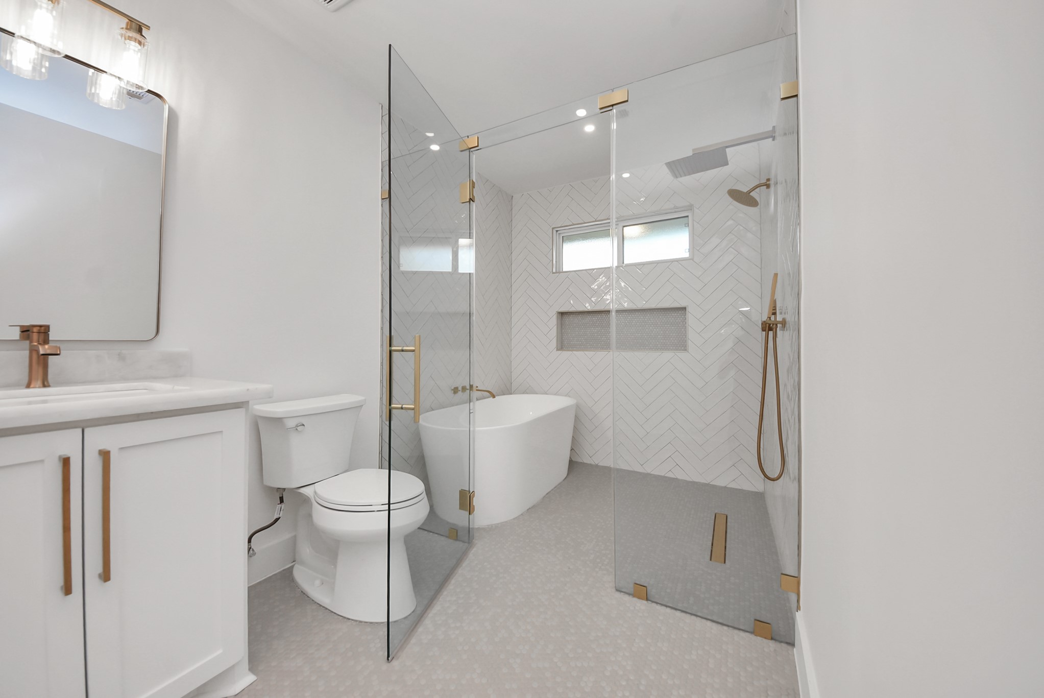 2318 Hialeah Drive Houston, TX 77018 - Photo 26 of 42 Primary bathroom features double sinks, walk in shower with separate soaking tub