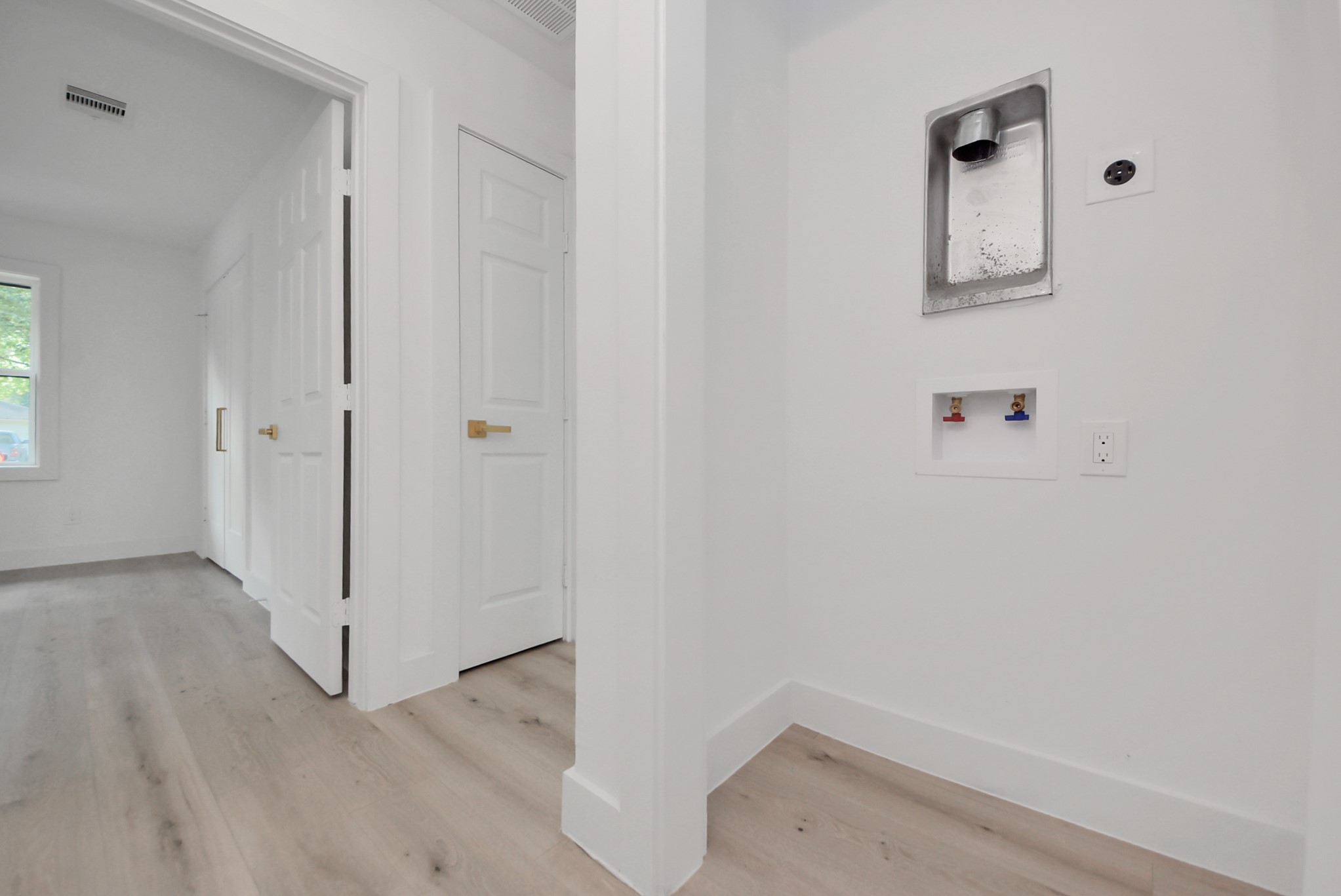 2318 Hialeah Drive Houston, TX 77018 - Photo 38 of 42 Laundry area in the hallway allows stackable washer and dryer