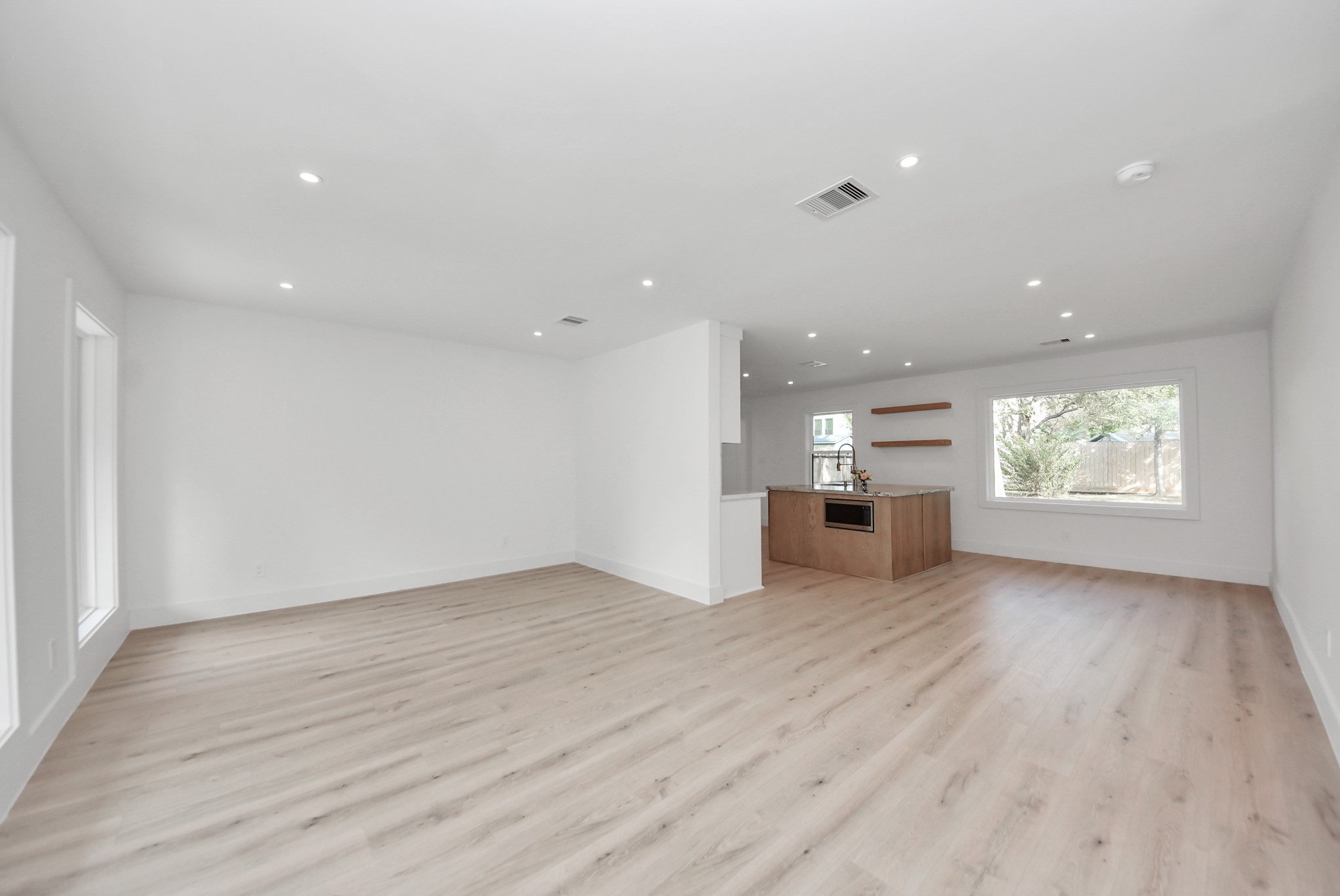 2318 Hialeah Drive Houston, TX 77018 - Photo 10 of 42 Open living concept with engineered wood floors and recessed lighting throughout