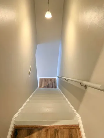 a bathroom with a sink a washer and dryer